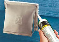 Caulking before painting a house Longmont.