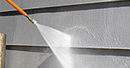 Power wash for painting a house Longmont.